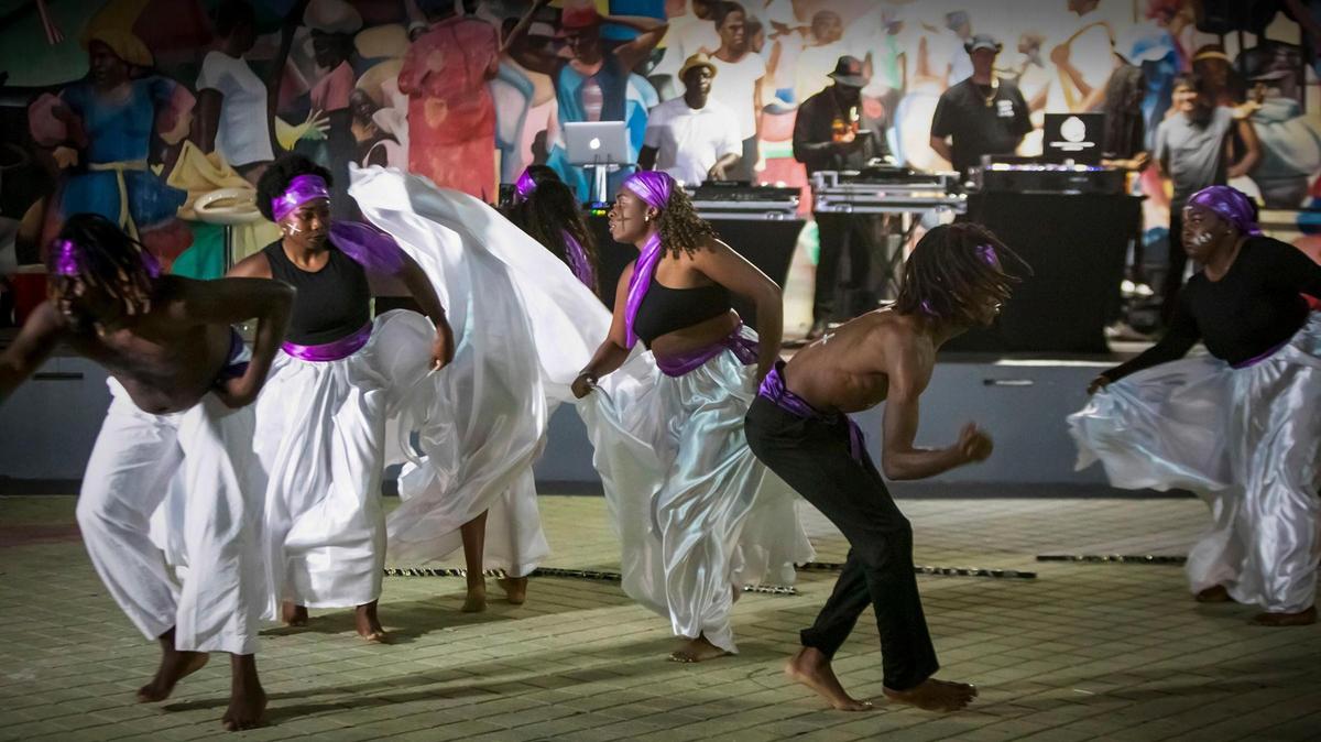 Members of the NSL Danse Ensemble perform in honor of Fèt Gede, the Haitian Day of Dead, at the Little Haiti Cultural Complex.