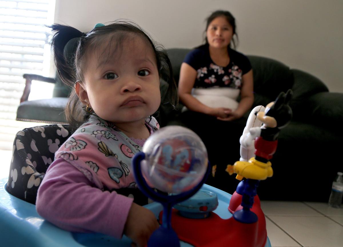 Catarina Gomez and 11-month-old daughter Ruth at home in Florida City on Tuesday, November 26, 2019.