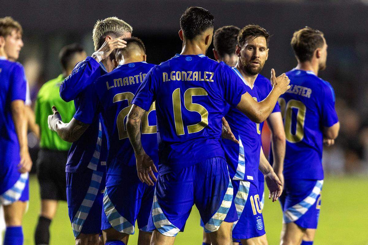Argentina players celebrate a goal against Puerto Rico during the second half of an international team friendly at Chase Stadium on Tuesday, October 14, 2025, in Fort Lauderdale, Fla.