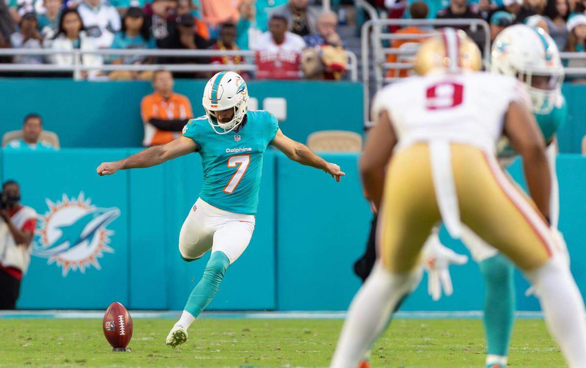 Miami Dolphins placekicker Jason Sanders (7) punts the ball during the first half of an NFL game against the San Francisco 49ers at Hard Rock Stadium on Sunday, Dec. 22, 2024, in Miami Gardens, Florida.