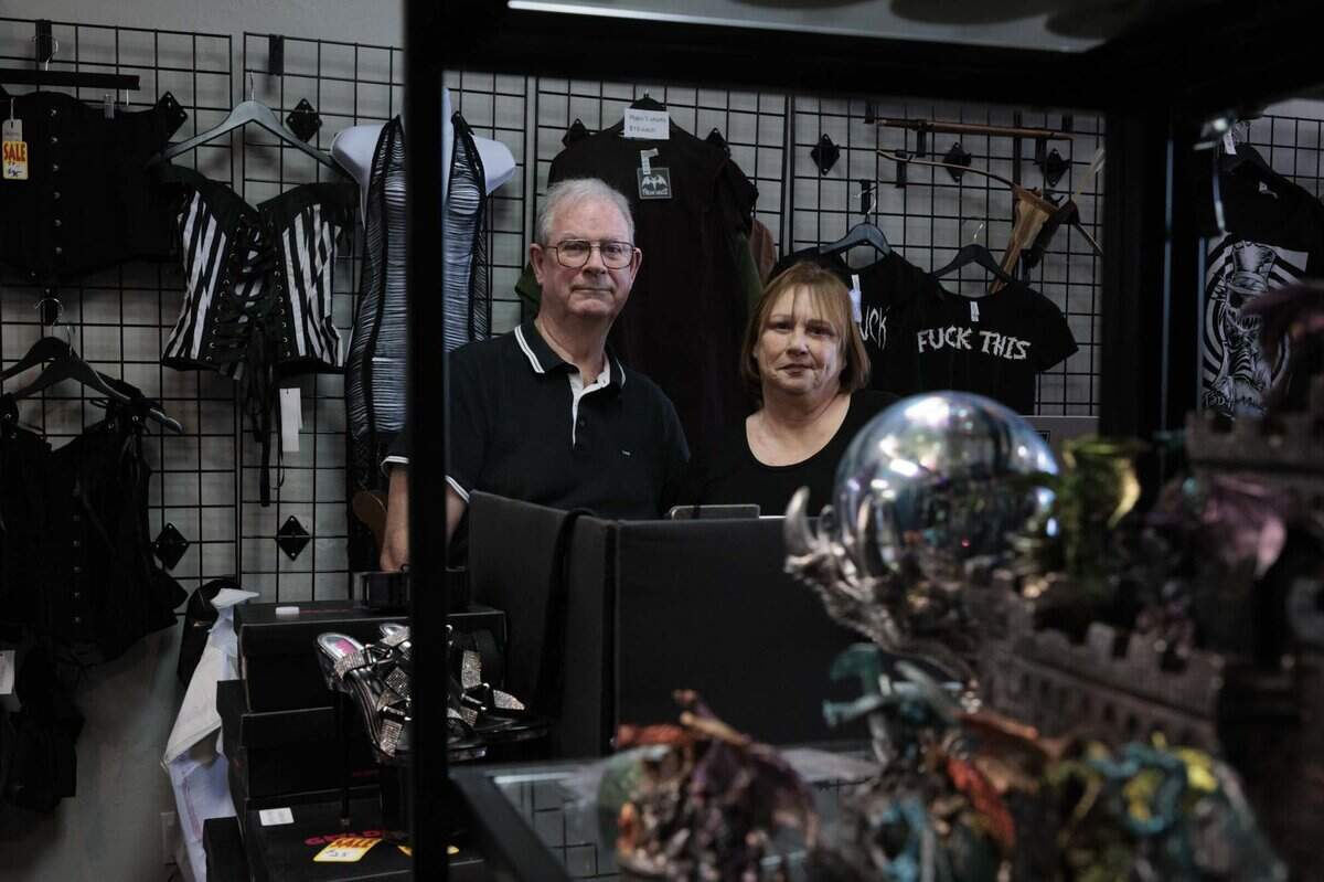 James Jones, left, owner and operator, poses with his wife, Ana, during their Closing Sale at their store, Freak House, an alternative clothing store, on Thursday, June 18, 2026, on S Dixie Hwy in Miami, Fla. Freak House, owned and operated by James and Ana Jones, is closing its doors next Friday.
