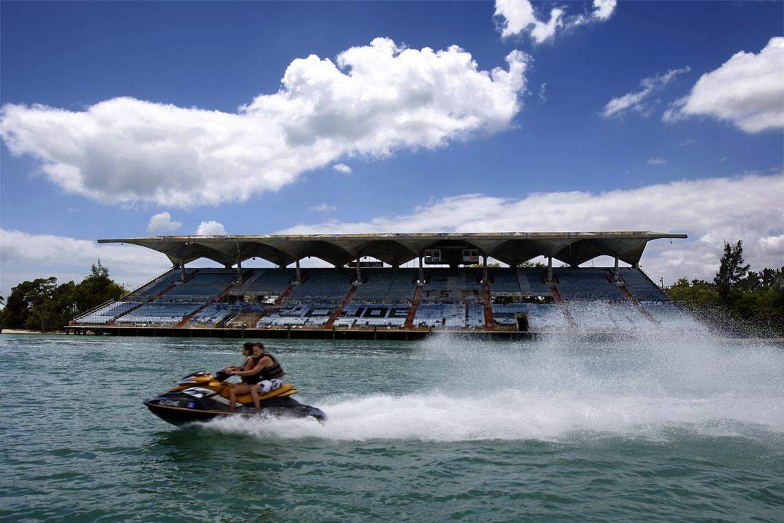 A personal water craft rider zooms past Miami marine Stadium in 2008.