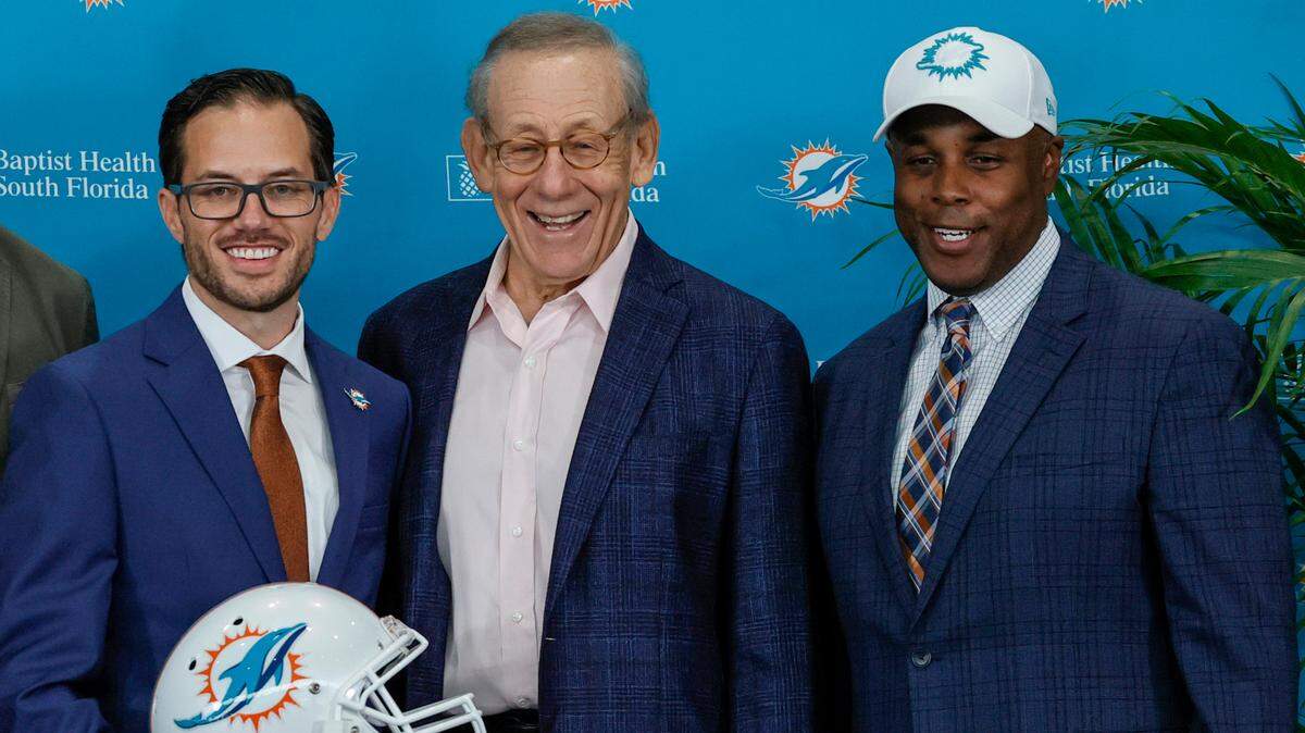 New Miami Dolphins head coach Mike McDaniel pose for the picture alongside Dolphins owner Stephen M. Ross and Dolphins Miami general manager Chris Grier during his introductory press conference at Baptist Health Training Complex in Hard Rock Stadium on Thursday, February 10, 2022 in Miami Gardens, Florida.