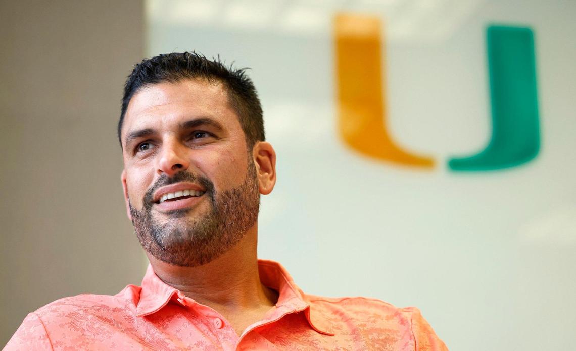 The Miami Hurricanes head baseball coach J.D. Arteaga is interviewed by a Miami Herald reporter in his office at Alex Rodriguez Park at Mark Light Field on Tuesday, July 18, 2023.