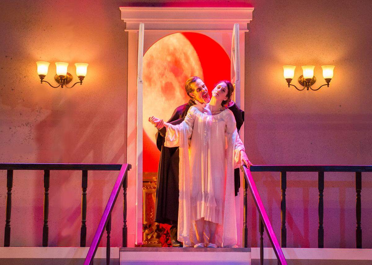 Carlos Orizondo’s Dracula takes a bite out of Isabelle Lopez’s Lucy in the Zoetic Stage world premiere of Michael McKeever’s “Dracula.”