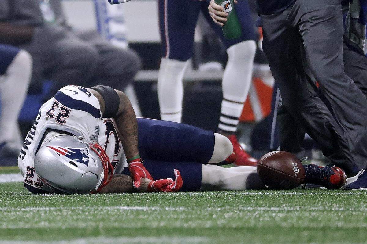 New England Patriots’ Patrick Chung lies injured on the field during the second half of the NFL Super Bowl 53 football game against the Los Angeles Rams, Sunday, Feb. 3, 2019, in Atlanta. (AP Photo/Chuck Burton)