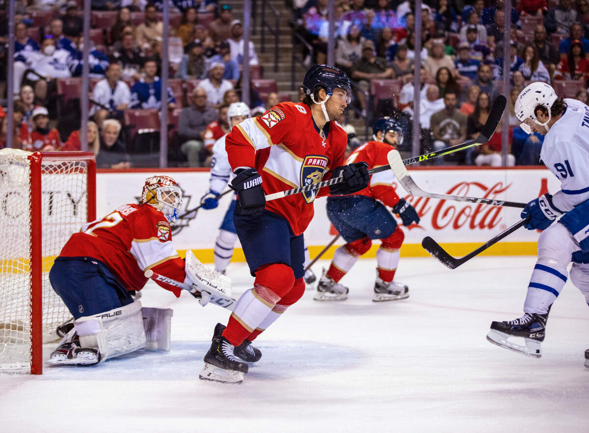 Florida Panthers goaltender Sergei Bobrovsky (72) and Panthers defenseman Ben Chiarot (8) defend the goal from Toronto Maple Leafs center John Tavares (91) during the first period of an NHL game at the FLA Live Arena on Tuesday, April 5, 2022 in Sunrise, Fl.