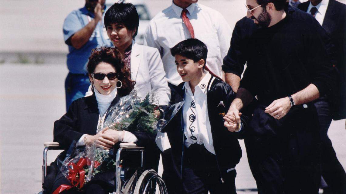 Singer Gloria Estefan returns to Miami International airport after a two-week hospital stay following a bus accident in Pennsylvania. About 200 fans and at least 50 members of the media welcomed Estefan, who said: “I’m so happy I got a sunshiny day. This is exactly what I need.”