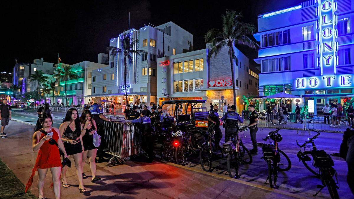 South Beach visitors walk along Ocean Drive during spring break in Miami Beach, Florida, on Saturday, March 9, 2024.
