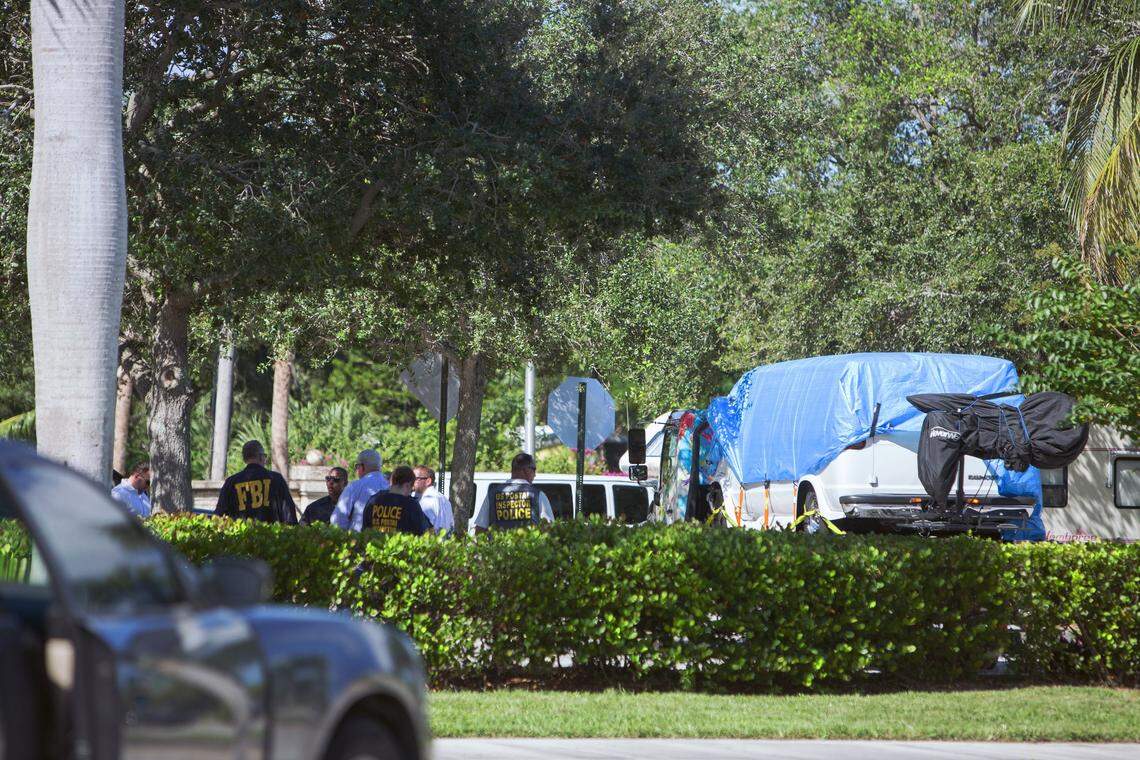 Law enforcement agencies, including the FBI, Plantation police, and the United States Postal Inspectors, gather at the AutoZone in Plantation, 801 S. State Road 7, after the arrest of Cesar Sayoc in the string of suspected explosive packages sent to prominent Democrats this week.  The FBI loaded the suspect’s white van onto a flatbed truck and towed it away.