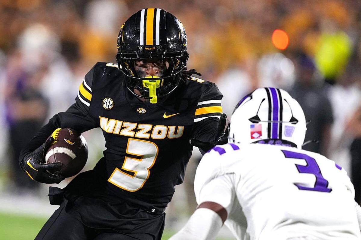COLUMBIA, MISSOURI - AUGUST 28: Wide receiver Kevin Coleman Jr. #3 of the Missouri Tigers runs against defensive back Dillon Williams #3 of the Central Arkansas Bears in the second half at Faurot Field at Memorial Stadium on August 28, 2025 in Columbia, Missouri. (Photo by Ed Zurga/Getty Images)