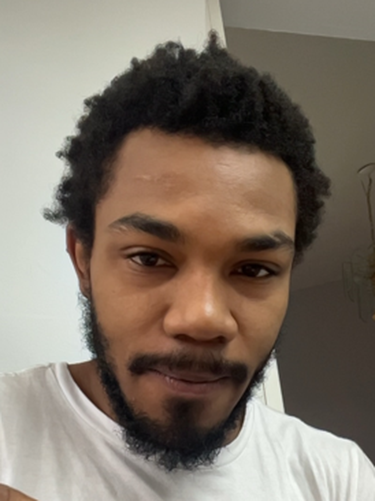 Haile Selaisse Richards, 27, is accused of killing his step-father in their Plantation home.