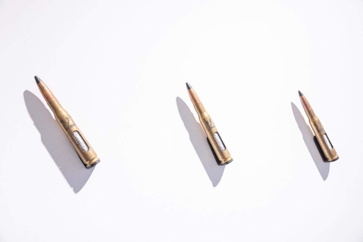 Artist Al Farrow retrofitted old shell casings into mezuzahs, which are doorposts often found in Jewish homes. The sculptures are on display at VISU Contemporary on South Beach.