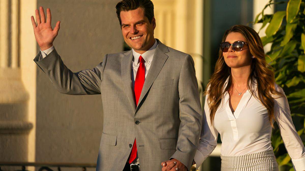 U.S. Representative Matt Gaetz (R-FL) and his fiancee Ginger Luckey arrive at the ‘Save America Summit’ at the Trump National Doral Resort in Doral, Florida, on Friday, April 9, 2021.