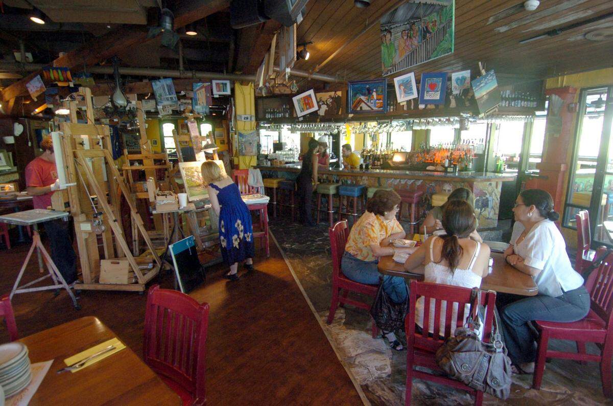 Miami Herald photo by Peter Andrew Bosch. Coconut Grove. Tu Tu Tango, seen in 2008, was one of the original tenants at CocoWalk.