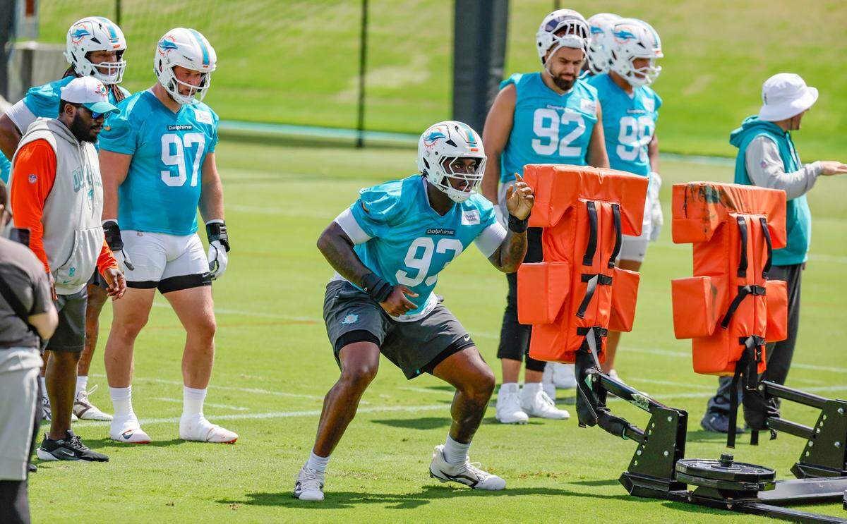 Miami Dolphins defensive tackle Zeek Biggers (93) works through drills during mandatory minicamp at the Baptist Health Training Complex in Miami Miami Gardens, Florida on Wednesday, June 11, 2025 