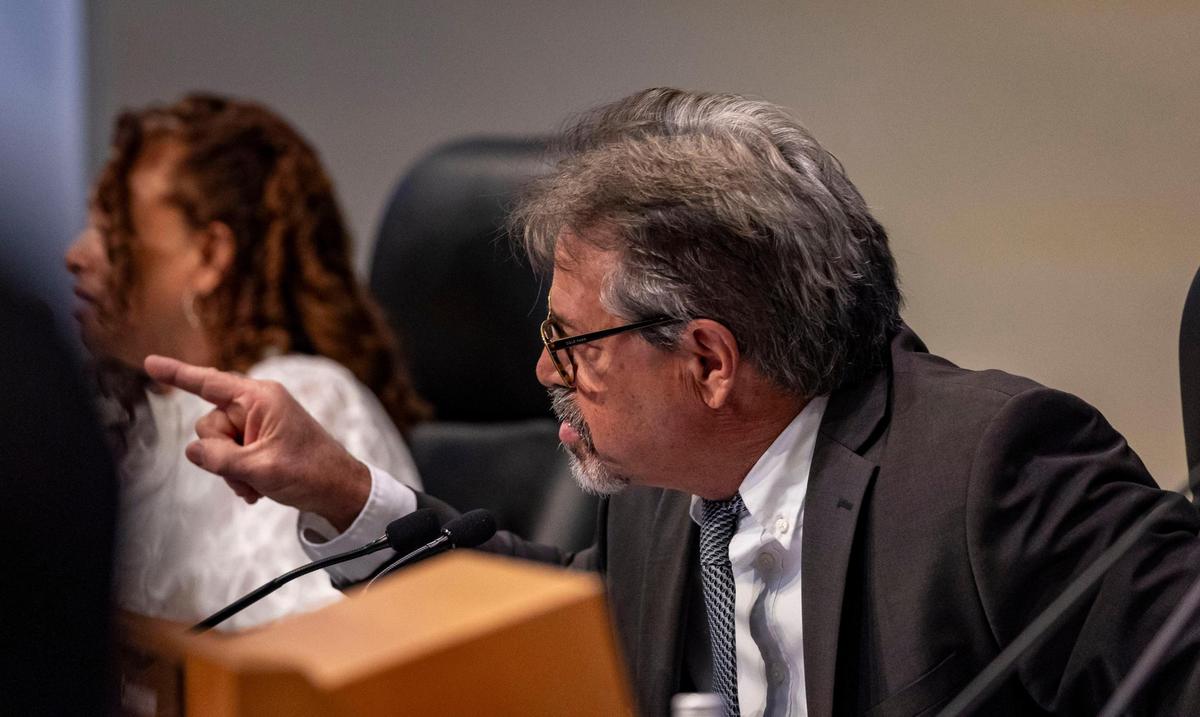 Miami City Commissioner Miguel Angel Gabela points at a speaker as he talks back to her during the public speaking portion of a Miami City Commission meeting on March 14, 2024.