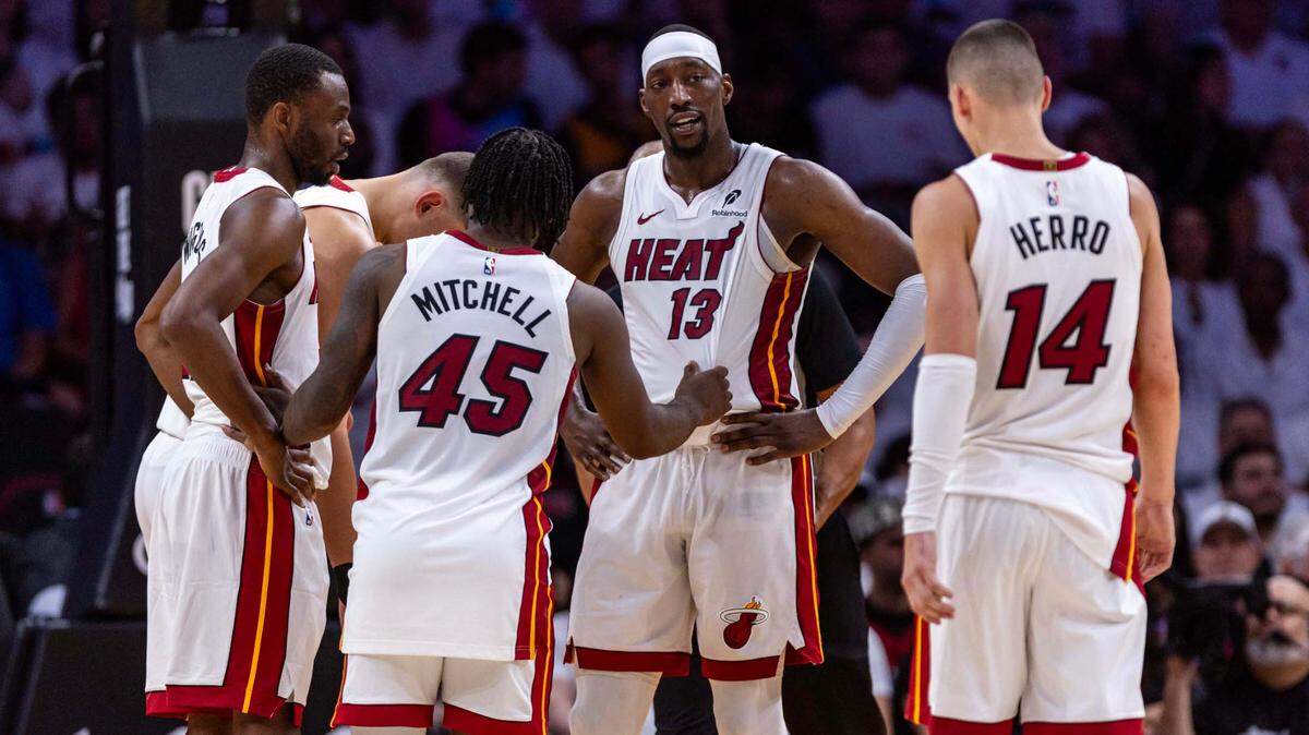 Miami Heat players react on the court while huddling up during the first half of Game 3 of the NBA Playoffs against the Cleveland Cavaliers at Kaseya Center on April 26, 2025, in Miami.
