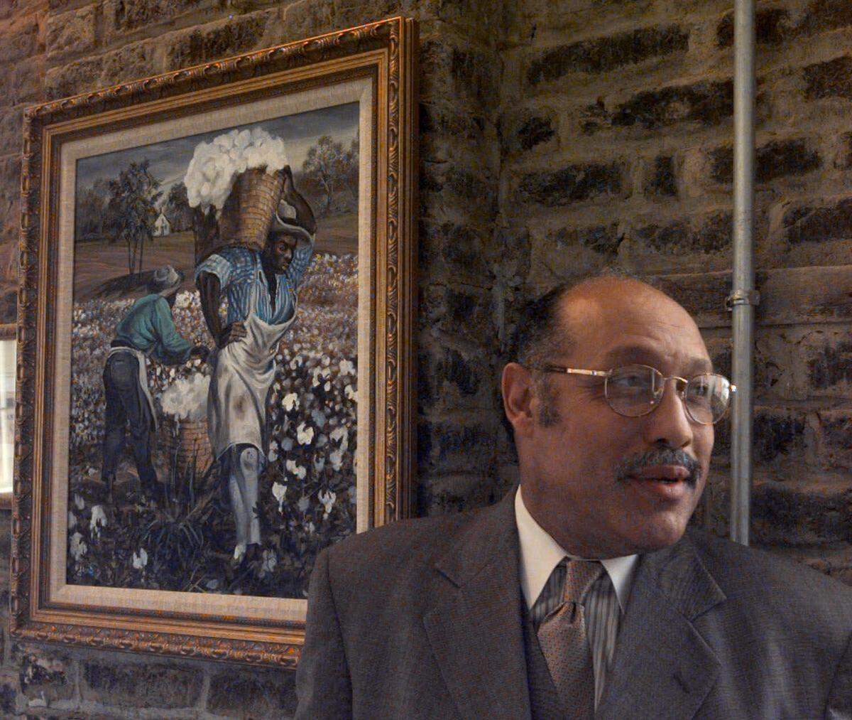 Artist John Jones of Columbia, S.C., talks about his paintings, which were on exhibit in June 2001 in Charleston, S.C. His paintings are scenes reproduced from Confederate bills and earlier Southern Bank notes. The exhibit was entitled the “Confederate Currency: The Color of Money.”