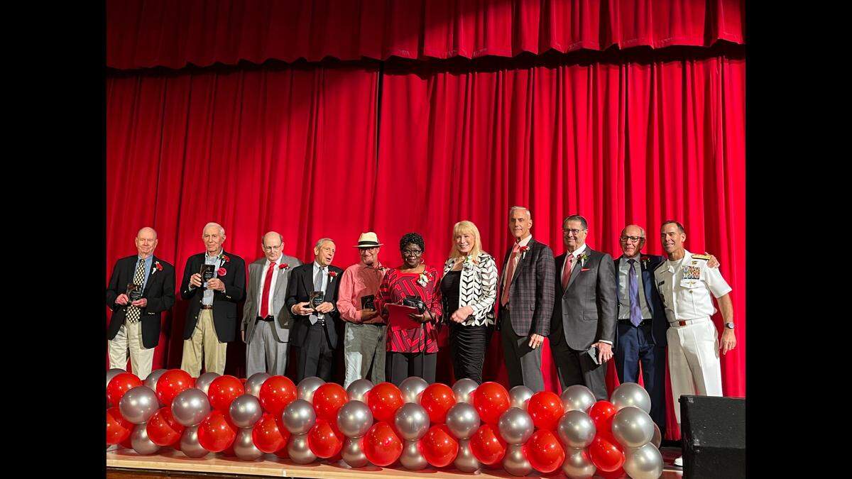Celebrating at the induction ceremony of the Coral Gables High School 2023 Hall of Fame are Bill Studeman, Dan Finora, Paul Steinhardt, Paul Huck, Jeff Oster, Alberta Jones, Lillian Glass, Mitchel Berger, Michael Zinner, Ted Leopold, and Keith Davids.