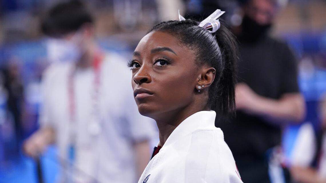 Simone Biles, of the United States, waits for her turn to perform during the artistic gymnastics women’s final at the 2020 Summer Olympics, Tuesday, July 27, 2021, in Tokyo.