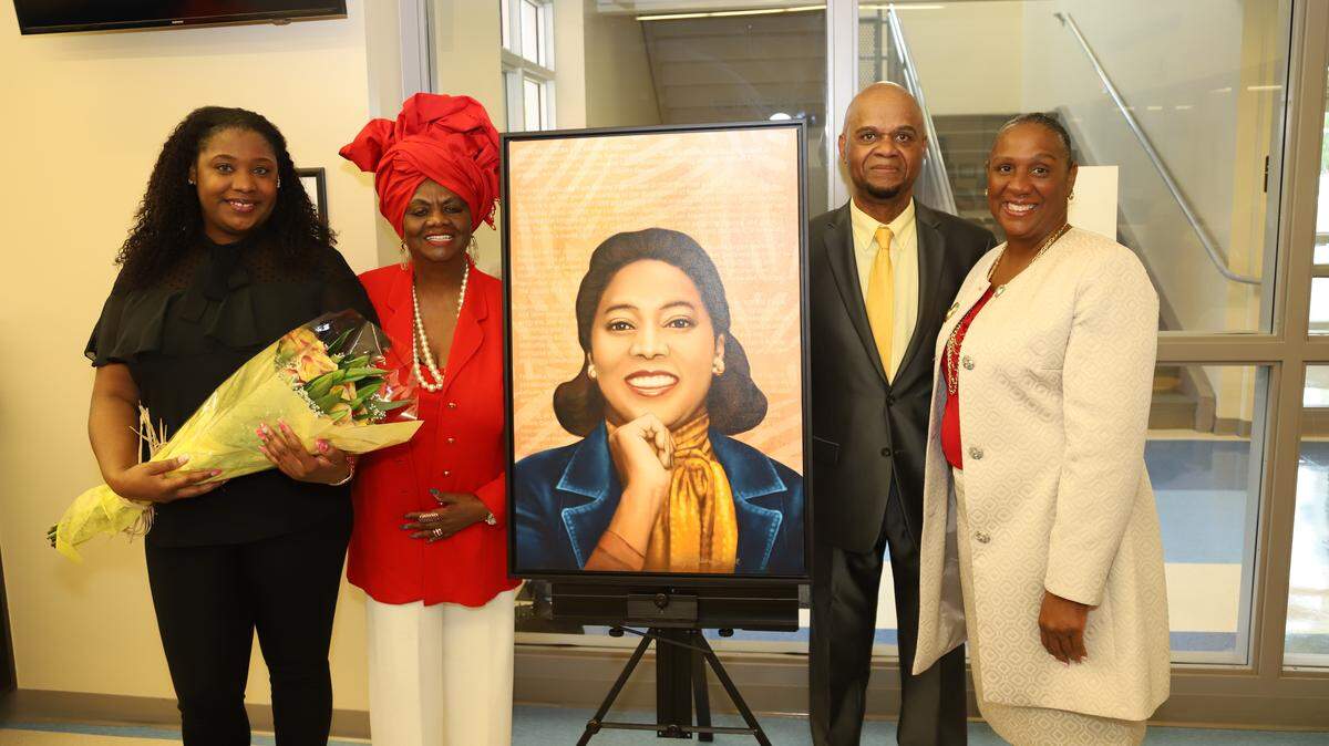 Francena B. Thomas’ grandaughter Kiana V. Thomas, Miami-Dade County School Board member Dorothy Bendross-Mindingall, artist C.J. Latimore and Thomas’ daughter Nifretta Thomas at the journalism academy dedication Sept. 7 at Frederick Douglass Elementary School in Overtown.