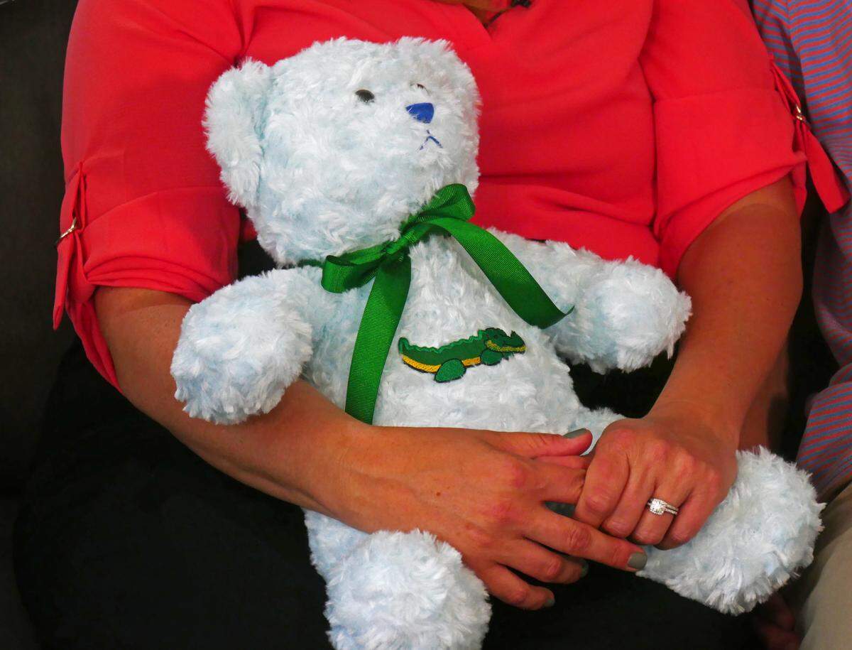 On the couch at the Johnsons’ home in Winter Park rests a baby blue teddy bear with a green ribbon around its neck. It weighs seven pounds, 13.2 ounces — exactly the same as Cooper at the moment of his birth.