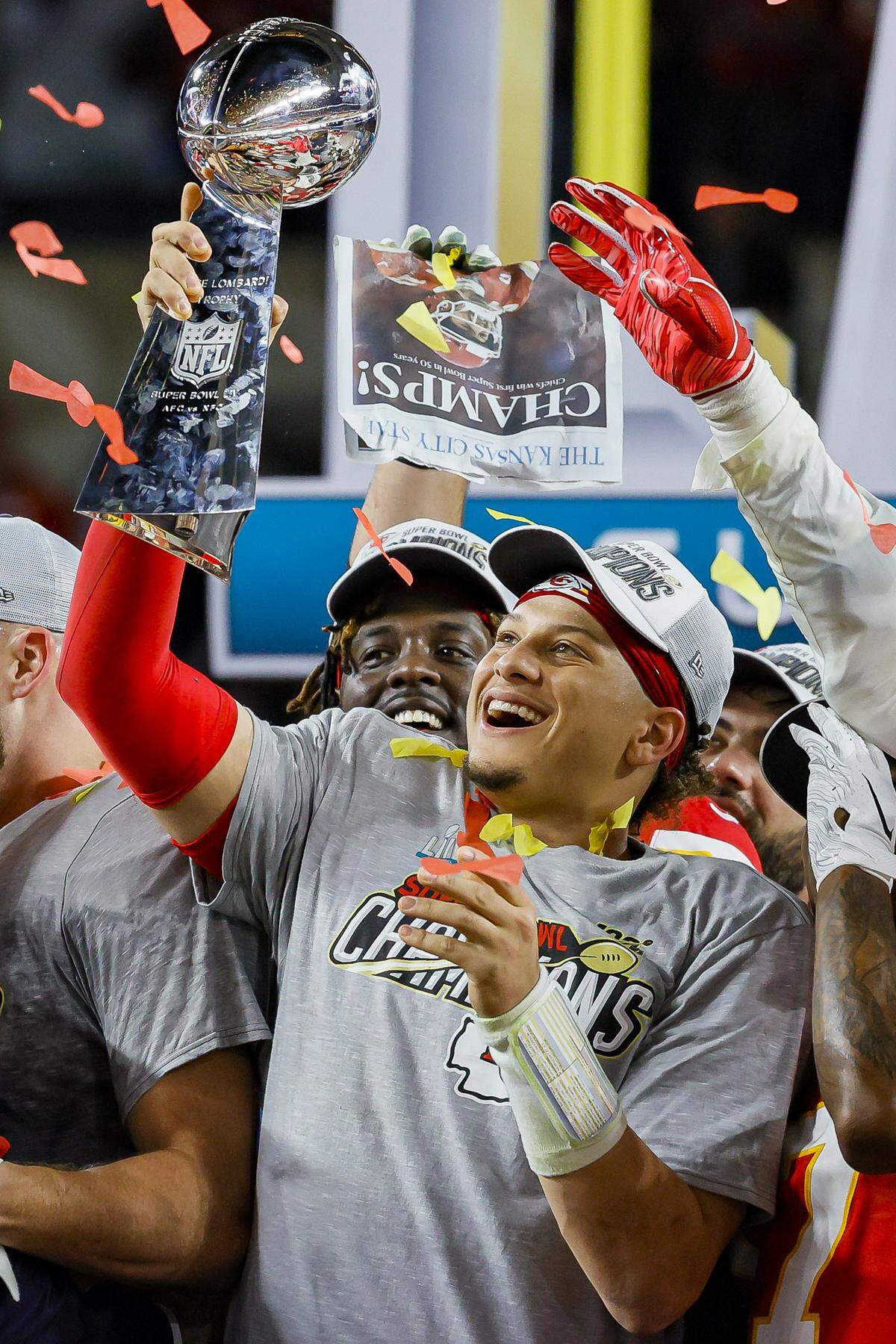 Chiefs quarterback Patrick Mahomes holds the Vince Lombardi Trophy after winning Super Bowl LIV against the San Francisco 49ers at Hard Rock Stadium in 2020.