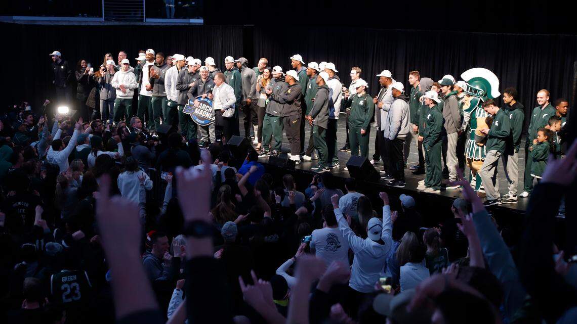 Michigan State players, staff and fans attend a rally, early Monday, April 1, 2019, in East Lansing, Mich., after the team returned from their NCAA men’s East Regional final college basketball game where they defeated Duke 68-67 to reach the Final Four.