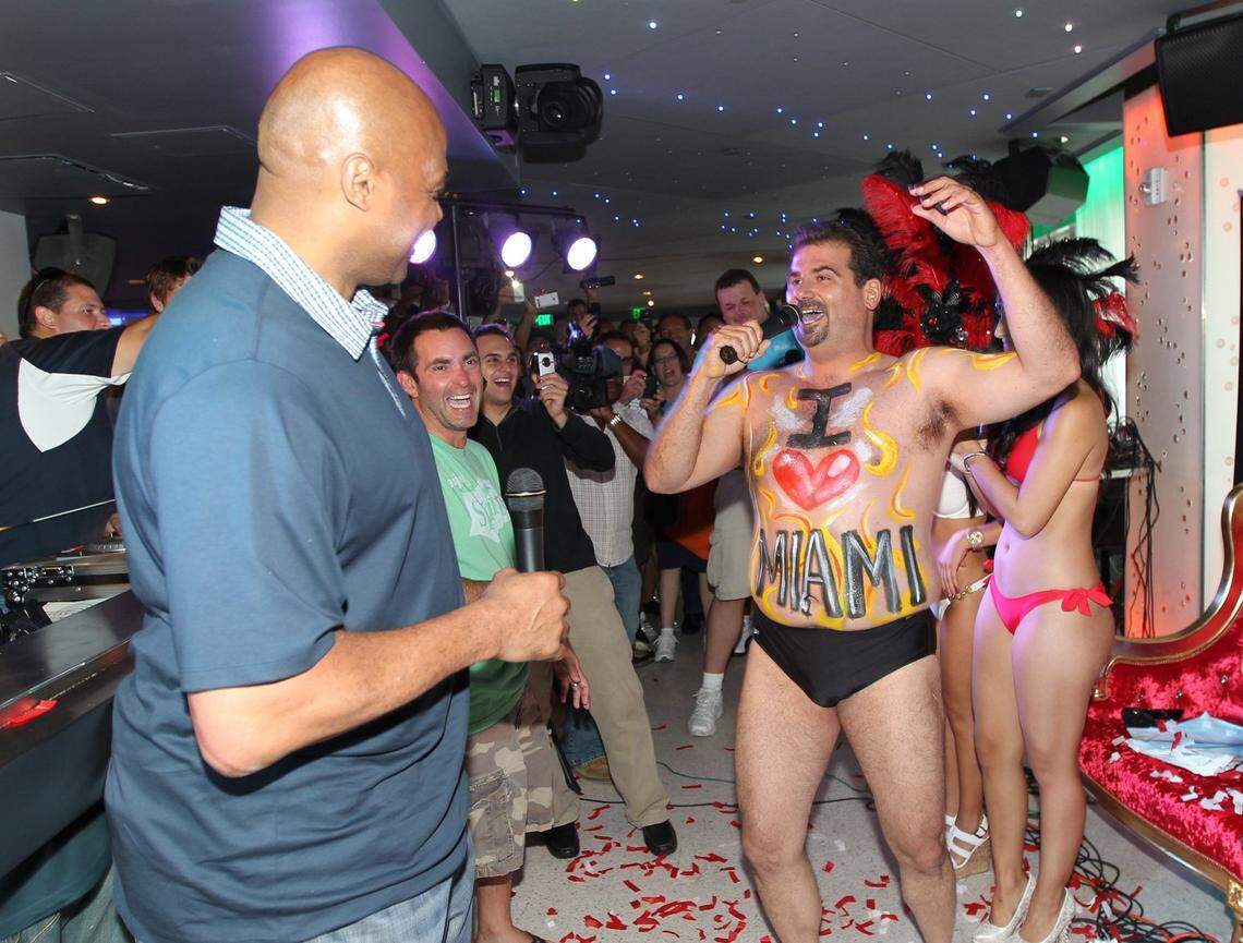 Dan Le Batard, right lost a bet with TV commentator Charles Barkely, left, and Le Batard was forced to wear a speedo at the Clevelander Hotel in 2012,