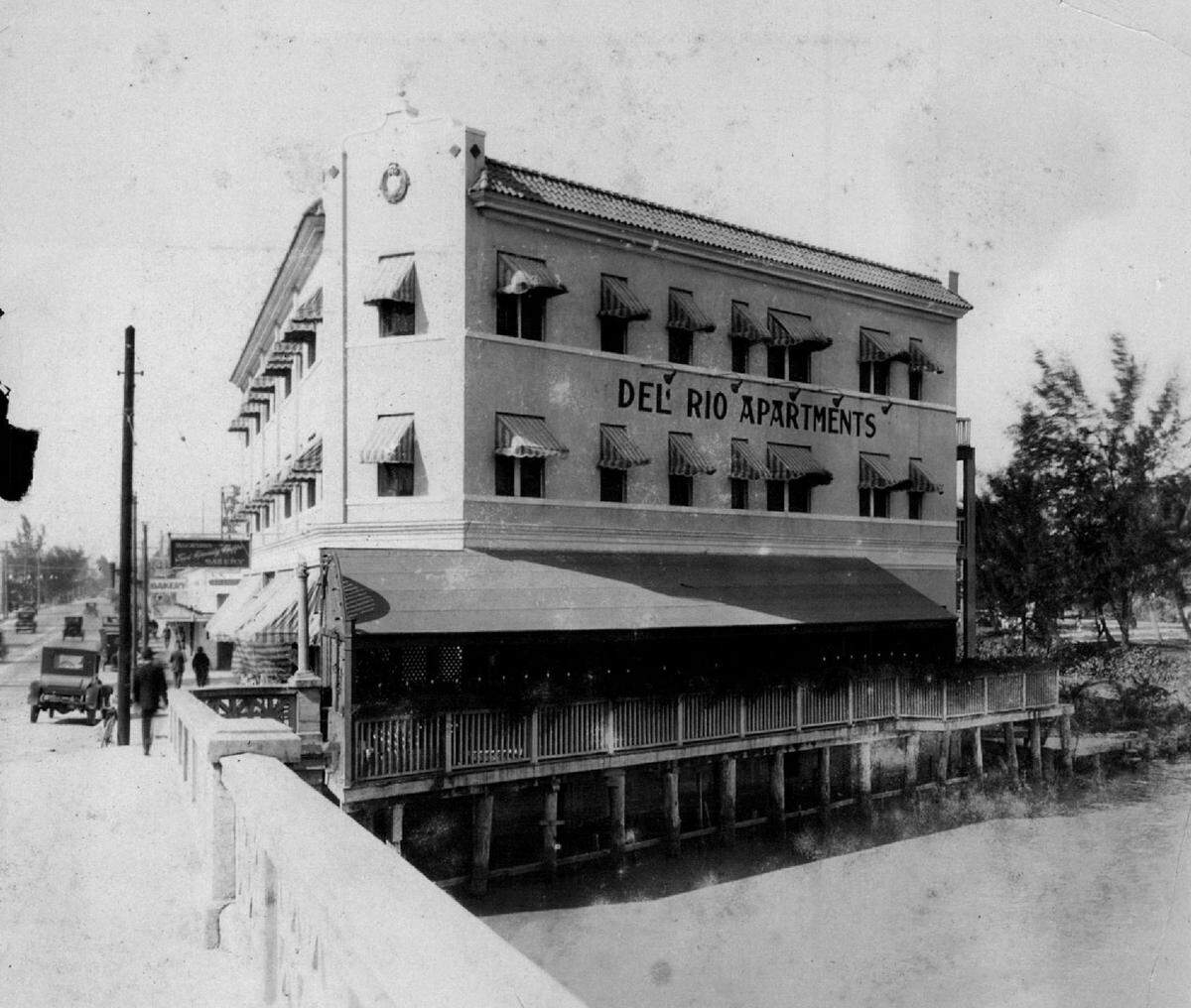 Del Rio Apartments on the Miami River & West Flagler Street, as seen from bridge.