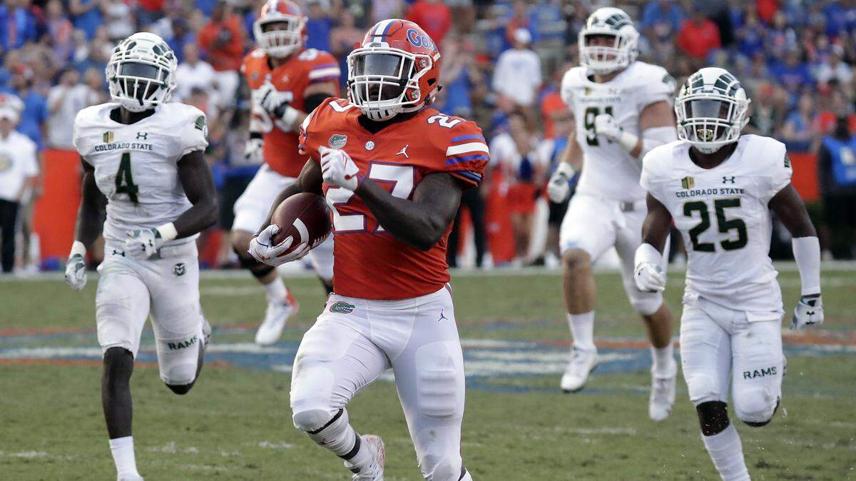 Florida running back Dameon Pierce gets past the Colorado State defense for a 68-yard touchdown run during the second half of Saturday’s game.