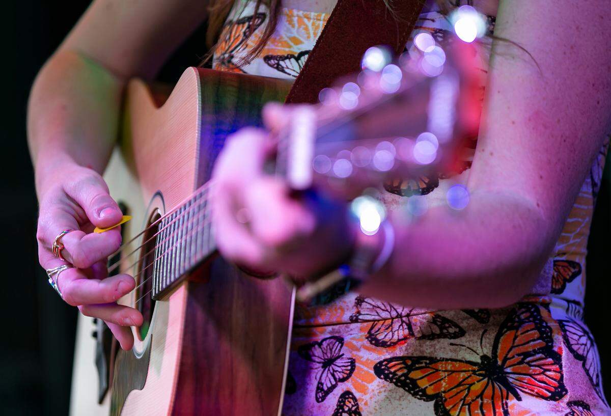 Singer Elle Haley performs at Hank’s Hair of the Dog Saloon in Key West, Florida, on Sunday, Dec. 12, 2021. In a short span, she’s become a regular performer with plenty of gigs to pay the bills.