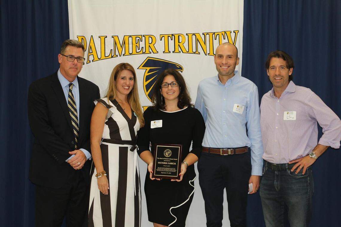 Victoria Garcia, center, was unanimously chosen by Palmer Trinity’s Alumni Award committee for this year’s “Head of School” Award, which is given to an alum who has “accomplished something extraordinary” in their community, according to school administrators.