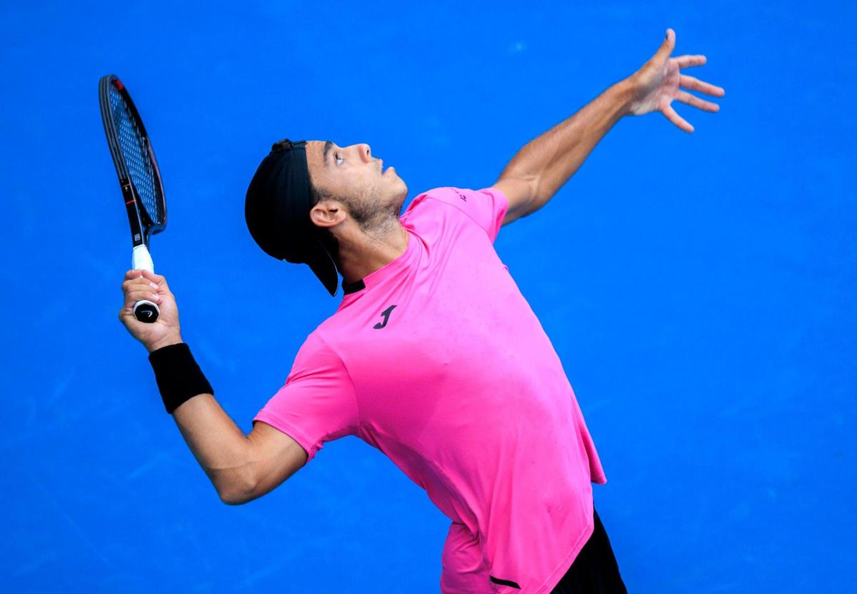Francisco Cerundolo of Argentina serves to Jannik Sinner of Italy during the Miami Open tennis tournament at Hard Rock Stadium on Wednesday, March 30, 2022 in Miami Gardens, Fl.