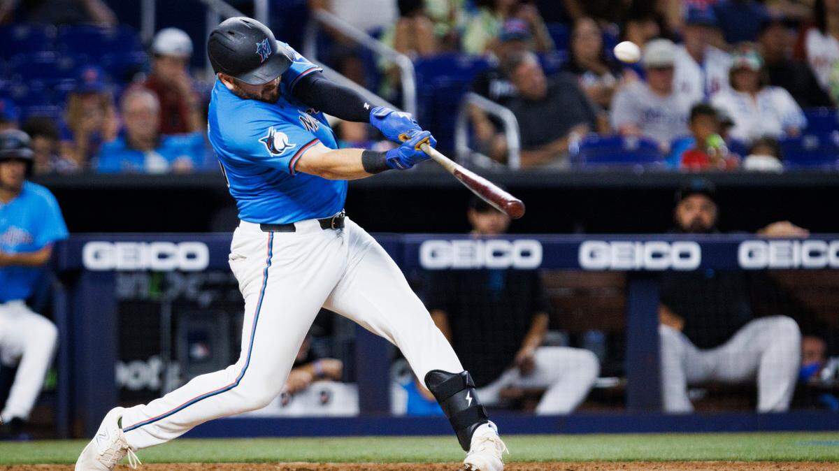 Miami Marlins third baseman Jake Burger (36) hits a home run during the seventh inning of a baseball game on Sunday, July 21, 2024, at loanDepot Park in Miami.