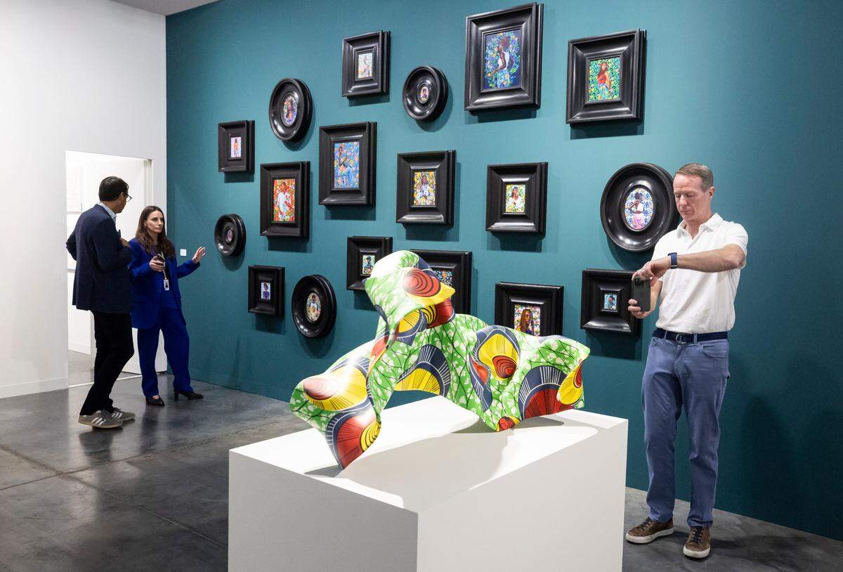‘Bronze (Green, Blue & Yellow)’ by Yinka Shonibare CBE RA presented by Stephen Friedman Gallery during Art Basel at the Miami Beach Convention Center on Wednesday, Dec. 4, 2024, in Miami Beach, Fla.