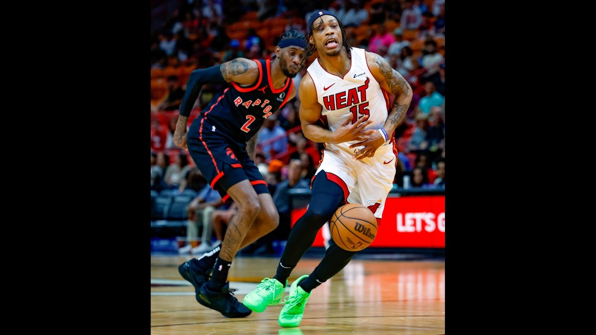 Miami Heat guard Alondes Williams (15) loses the ball as Toronto Raptors forward Jalen McDaniels (2) gives chase during the fourth quarter of the regular-season finale for the Heat at the Kaseya Center, Miami, on April 14. The Kings reportedly added McDaniels in a trade Thursday, during Round 2 of the NBA draft.