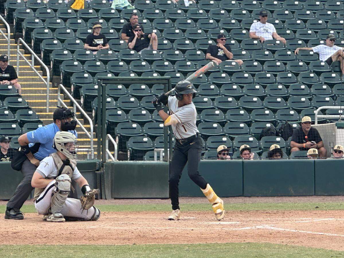 American Heritage’s Mark Asencio bats against Orlando Bishop Moore on Tuesday in a Class 4A state semifinal at Hammond Stadium in Fort Myers, Fla.