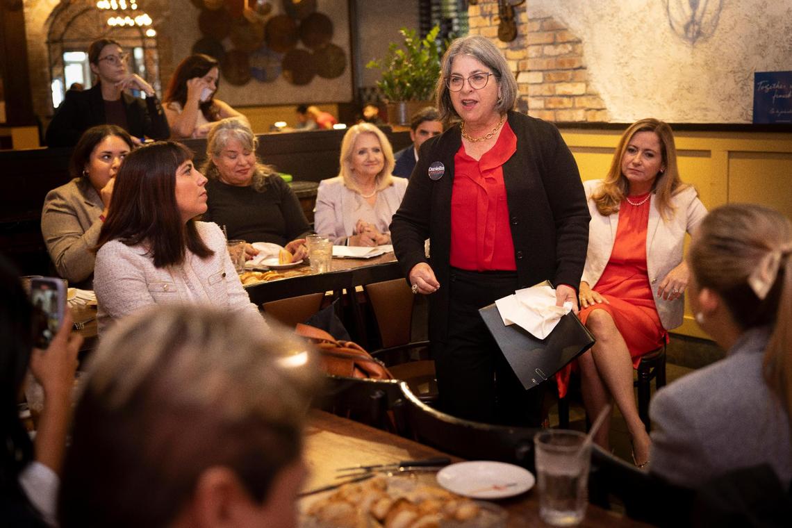 Mayor Daniella Levine Cava, center, speaks during a Democratic roundtable session held on Wednesday, Nov. 8, 2023, at Sergio’s in Doral.