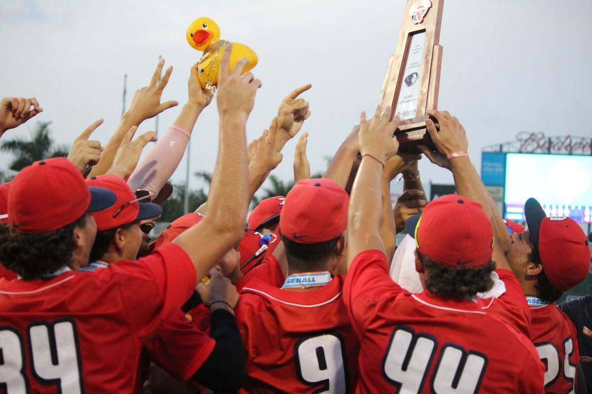 Doral Academy’s baseball team celebrates its first state championship on Saturday night at Hammond Stadium in Fort Myers.