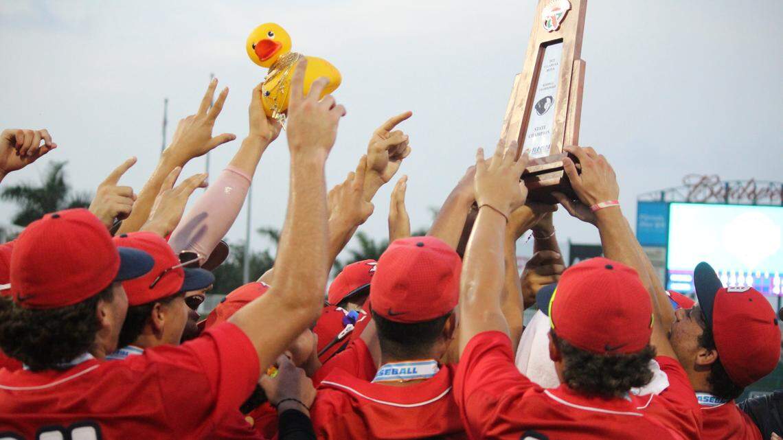 Doral Academy’s baseball team celebrates its first state championship on Saturday night at Hammond Stadium in Fort Myers.