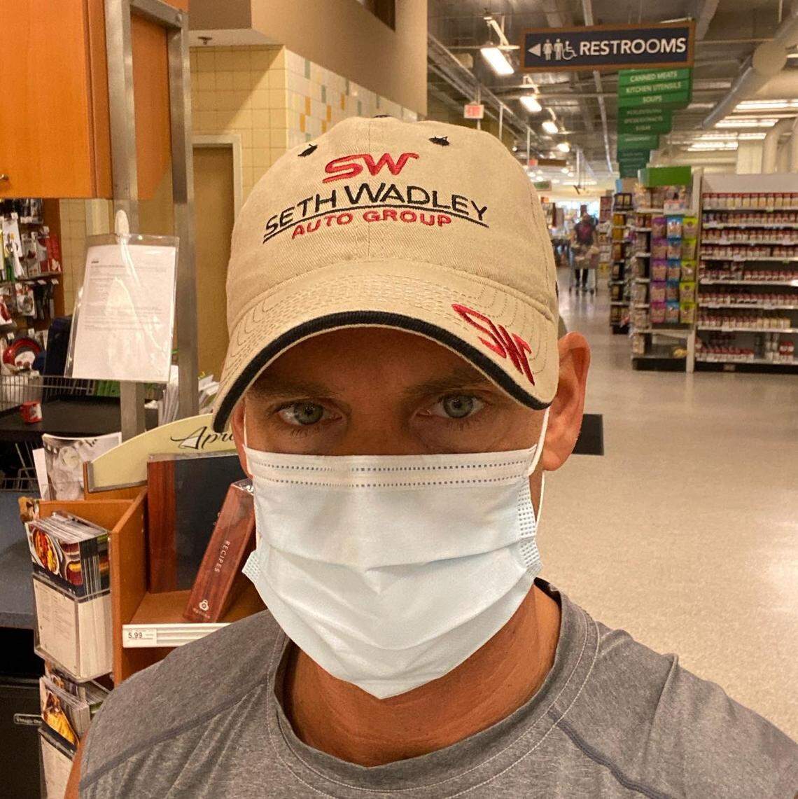 State Rep. Michael Grieco, who represents Miami Beach, demonstrates how he covers his face while grocery shopping.