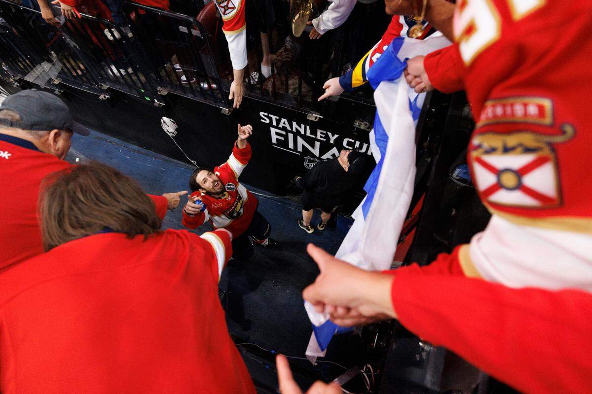 Florida Panthers left wing Ryan Lomberg (94) points up the fans as he heads into the locker room after the Florida Panthers won the Stanley Cup Final at the Amerant Bank Arena on Tuesday, June 25, 2024 in Sunrise, Fla.
