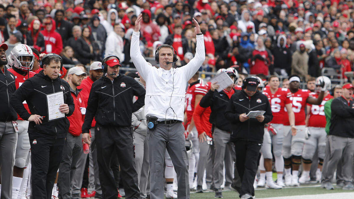 Ohio State head coach Urban Meyer instructs his team against Michigan during an NCAA college football game Saturday, Nov. 24, 2018, in Columbus, Ohio.