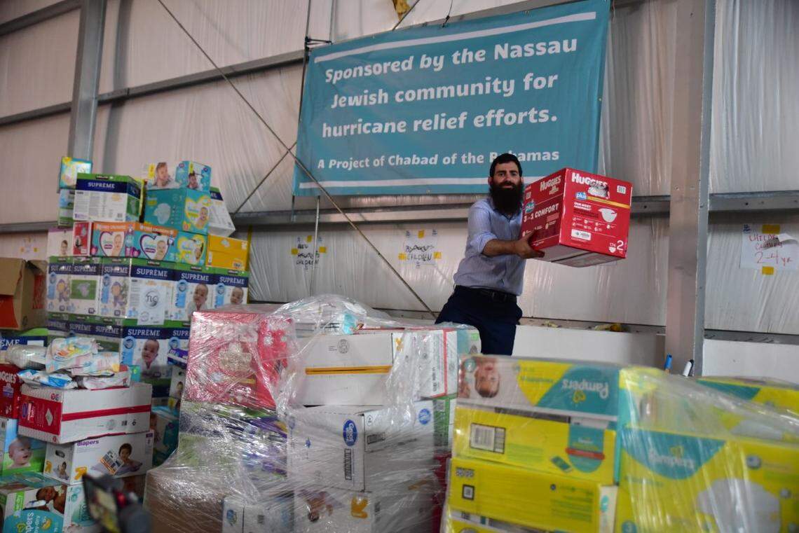 Rabbi Sholom Bluming organizes food and other supplies to deliver to Freeport in the Bahamas in the days after Hurricane Dorian hit the island nation on Sept. 1, 2019.