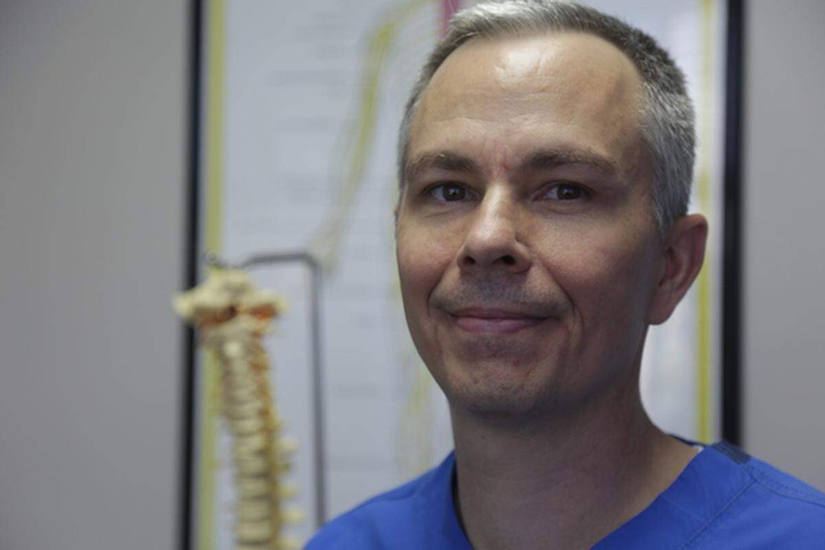 Dr. Kevin Reiseck at his South Miami chiropractic clinic, the Miami Spine Center.