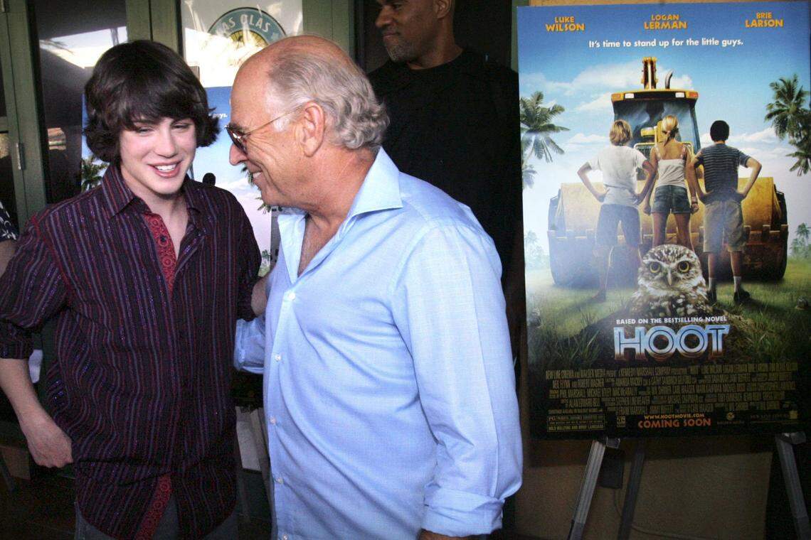 In 206, Jimmy Buffett apeared at the red carpet premiere of the movie “Hoot,” based on a Carl Hiaasen book. The event was at the Sunrise Las Olas Cinema in, Fort Lauderdale. Here, Logan Lerman, left, who stars in the film as the lead character Roy, spends a moment talking with co-producer Buffett at the premiere.