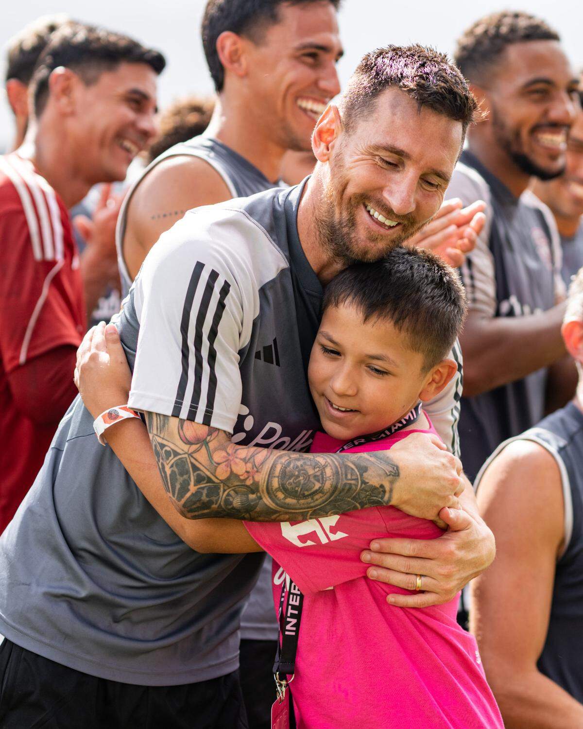 Argentine star Lionel Messi shares a hug with a Make-A-Wish child at Chase Stadium on Sept. 24, 2024.
