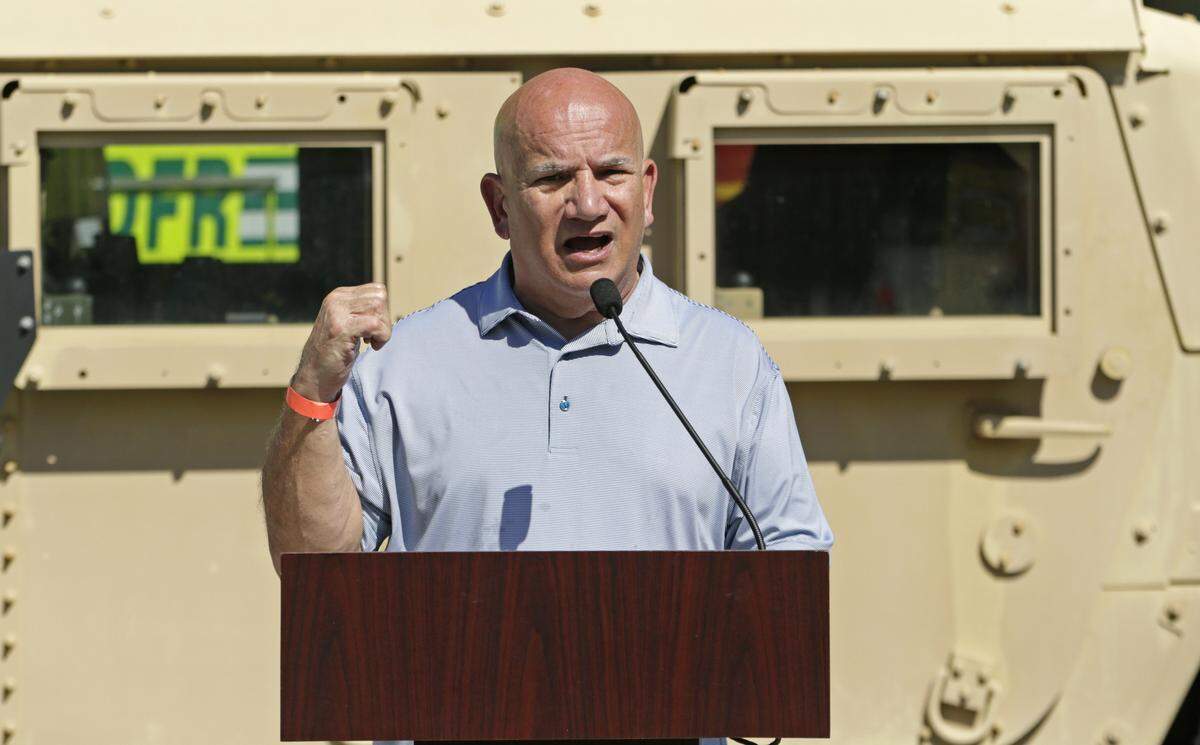 Jackson Health CEO Carlos Migoya speaks at the opening of a COVID-19 drive-thru testing site March 24, 2020, in Miami. This week, Migoya asked the Trump administration to send more relief funds to safety net hospitals.